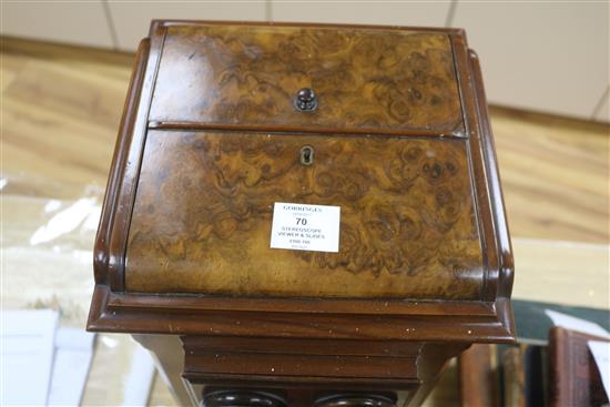 A Victorian burr walnut table top stereoscope viewer with slides/photos